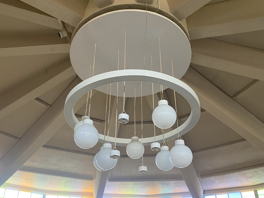 Pendant lighting retrofit in auditorium ceiling